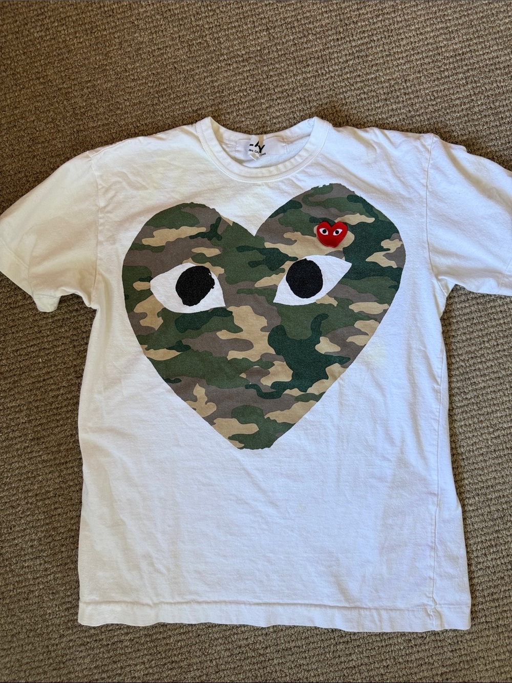 Comme des Garcons Men’s  White Tee with Camo Heart and Red Eye Patch